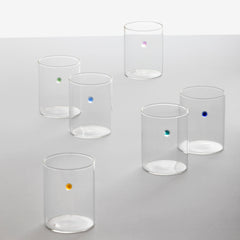 6 mouthblown glasses each with a small colored dot.