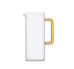 Decorative tube water jug made of glass with a yellow handle.